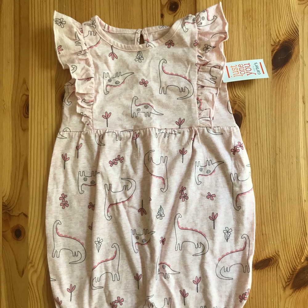 Pink dinosaur one piece outfit